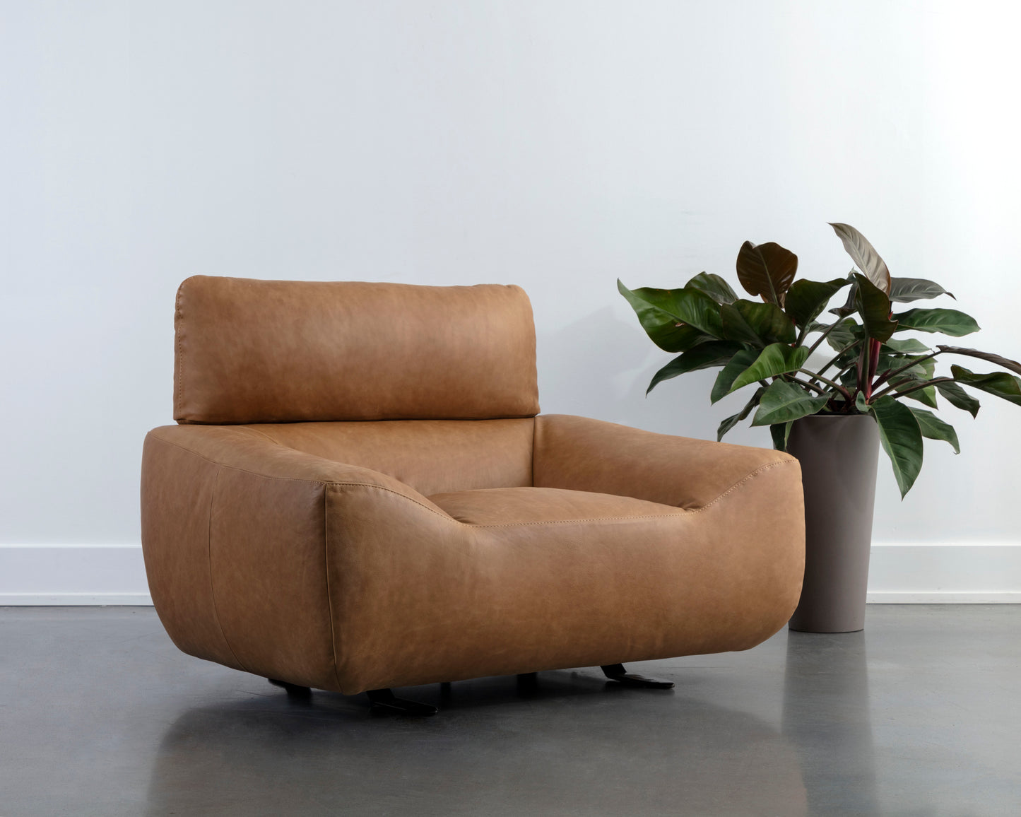 NAHLA PAGET GLIDER LOUNGE CHAIR - CAMEL LEATHER