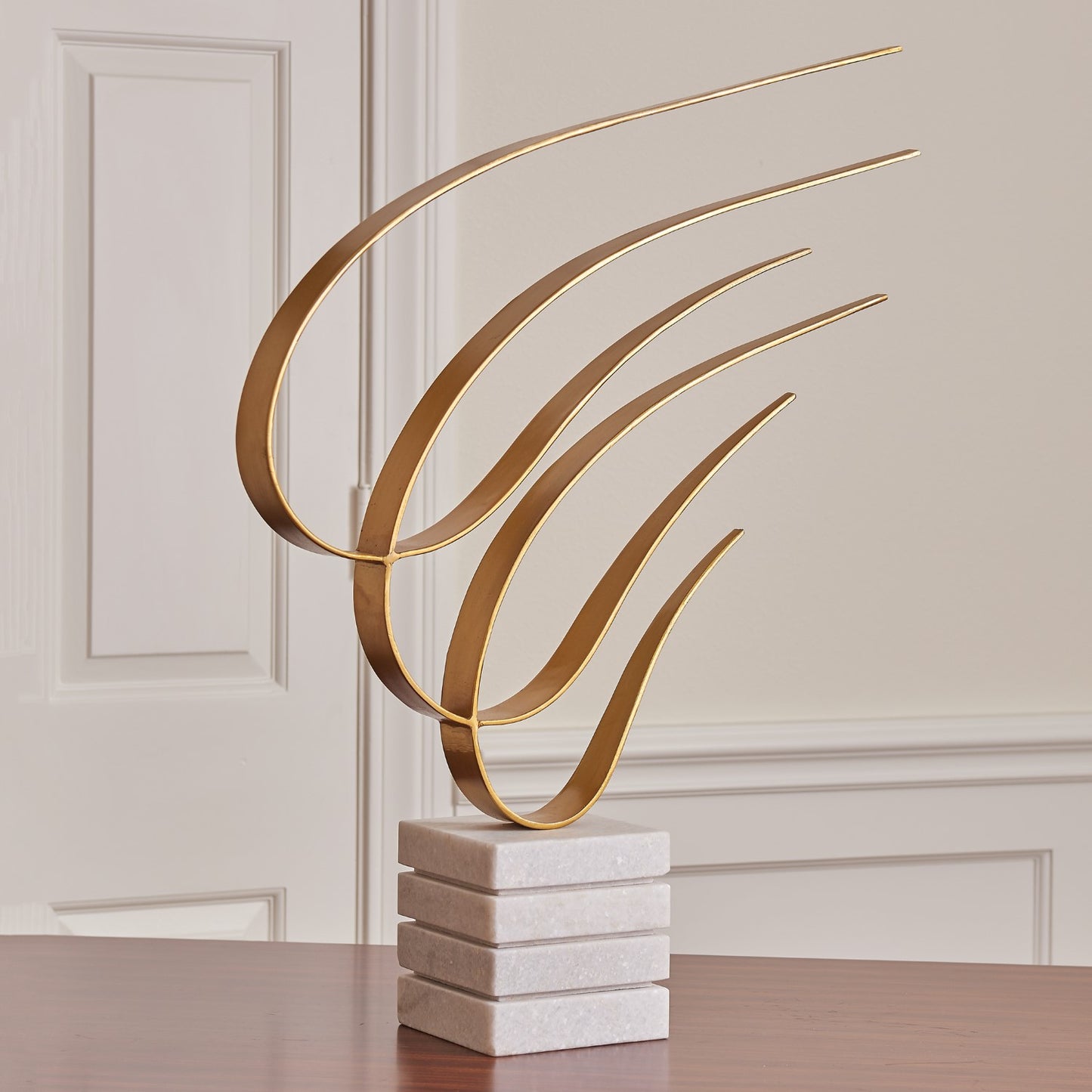 SWOOSH SCULPTURE-GOLD